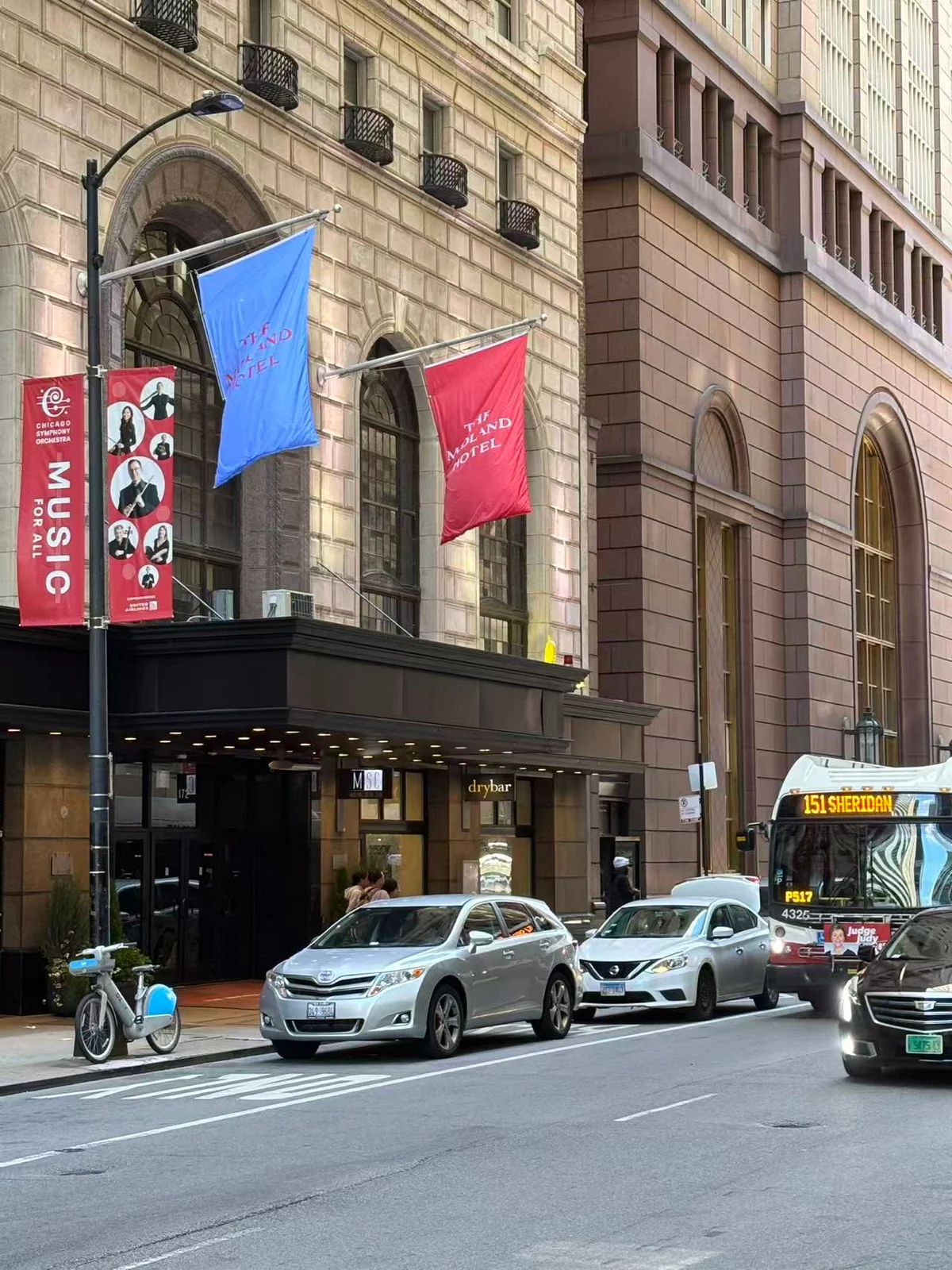 The ornate entrance of a theatre on a Chicago street